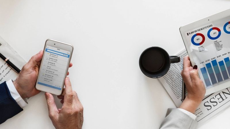 iPad and phone with coffee