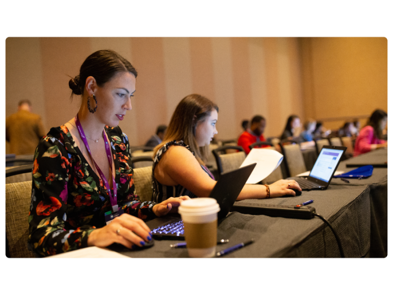 woman typing on a laptop 