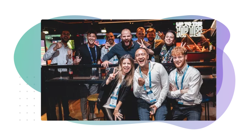 Group of people posing for the picture.